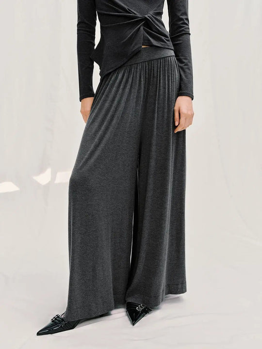 Pantaloni a gamba larga con fascia elastica pieghettata in vita