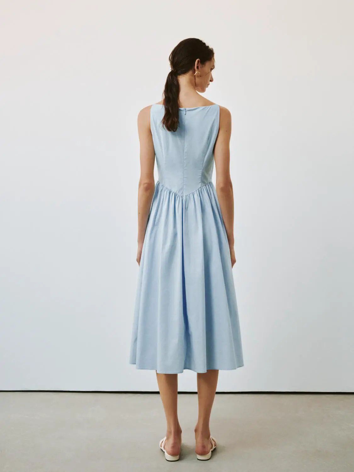 Sleeveless shirring-detail A-line midi dress in pale blue, back view, by Urban Revivo Fashion