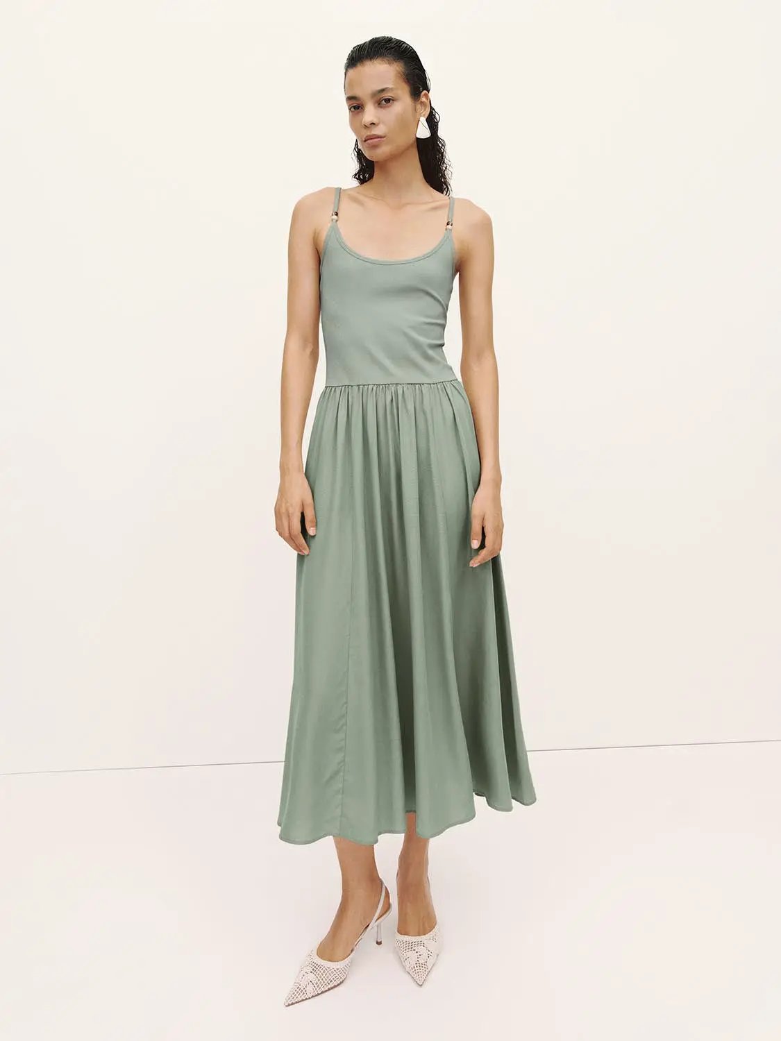 A-Line dress in sage green with thin straps; midi-length