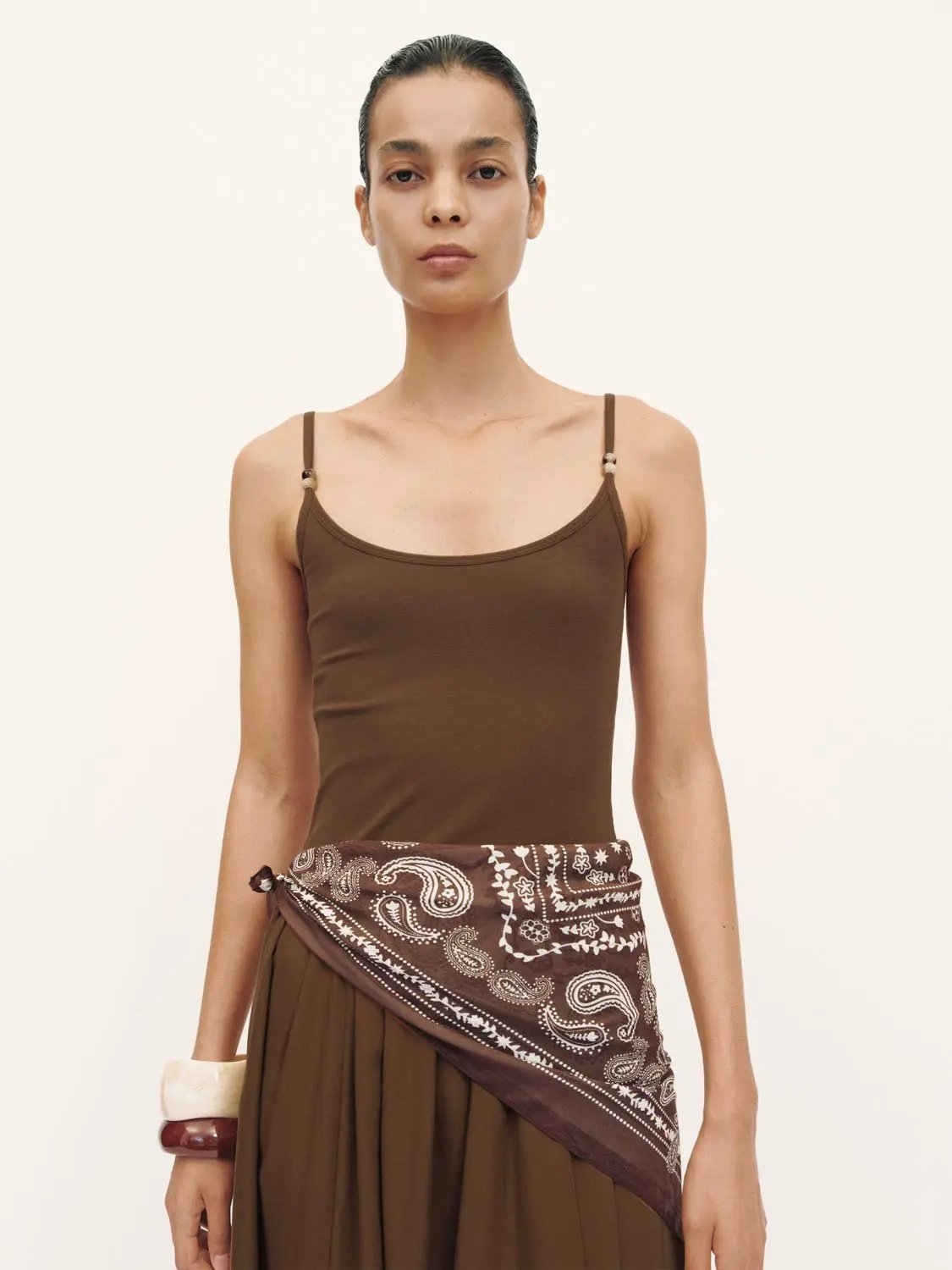 A-line dress in brown with thin spaghetti straps and paisley scarf belt, Urban Revivo Fashion.