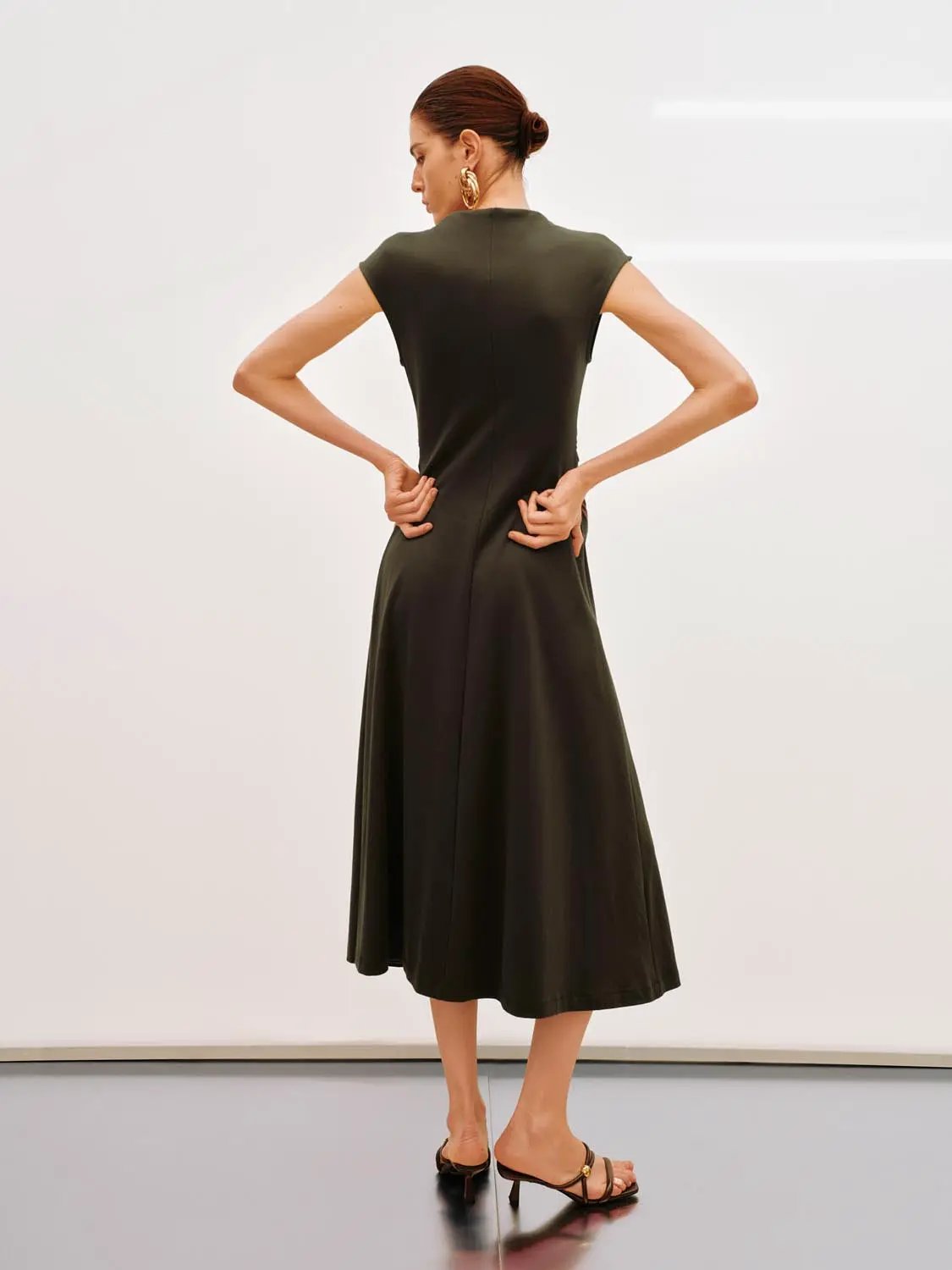 Dress from Urban Revivo Fashion, olive green A-line midi dress, back view.
