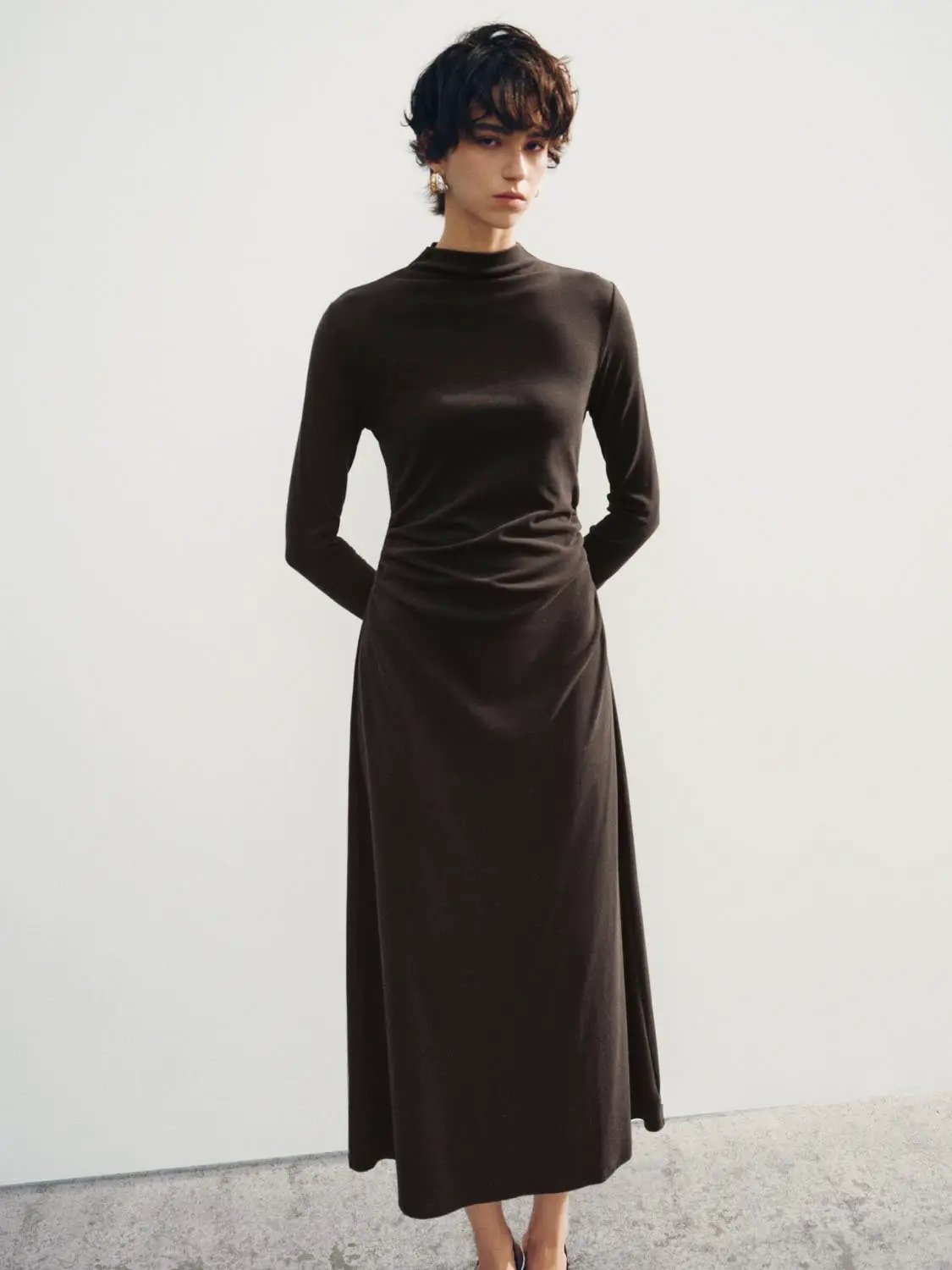 A-Line Dress in dark brown with long sleeves and a high neckline, midi length
