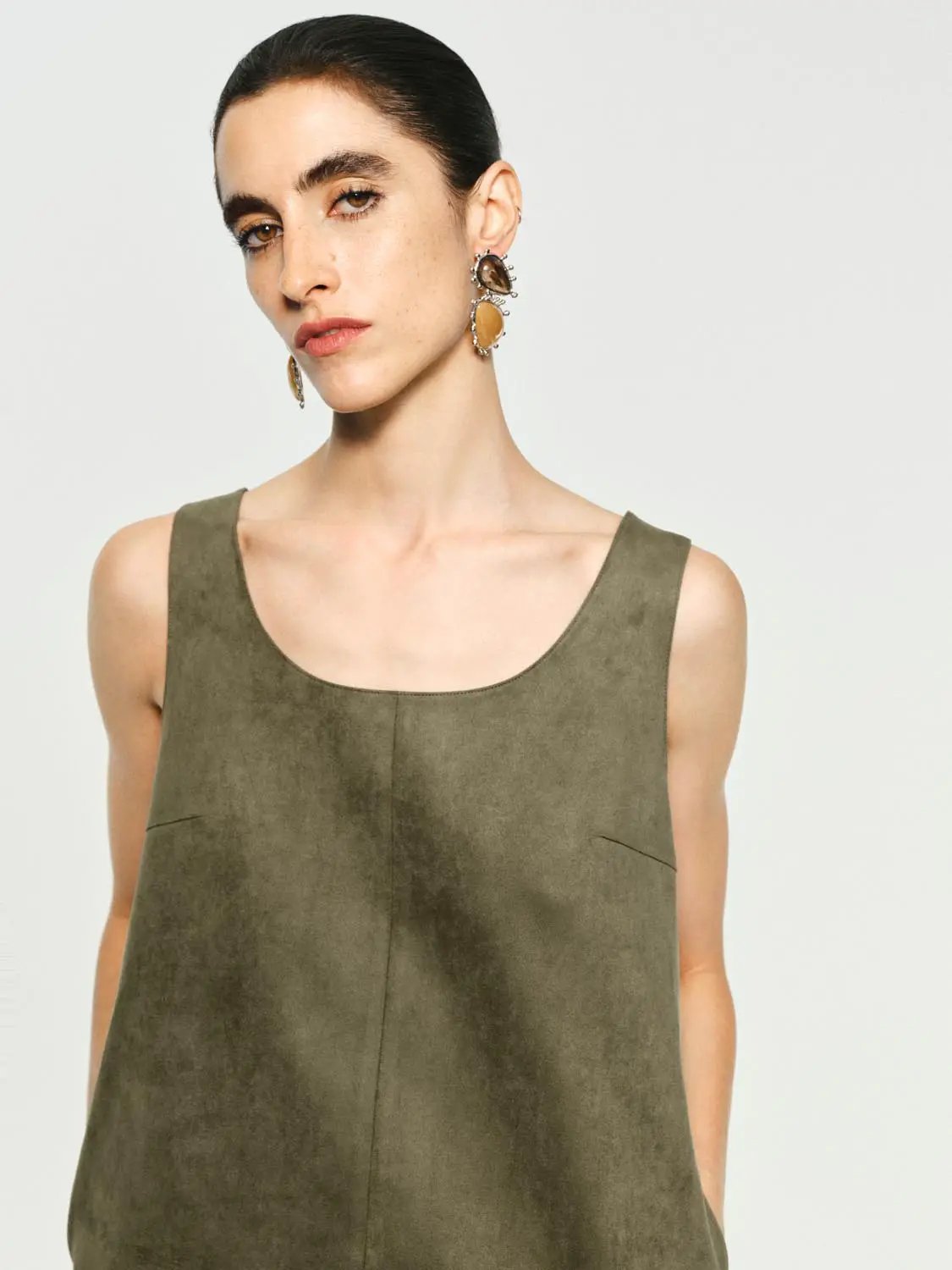 Panelled straight-hem A-line sleeveless mini dress in olive green.