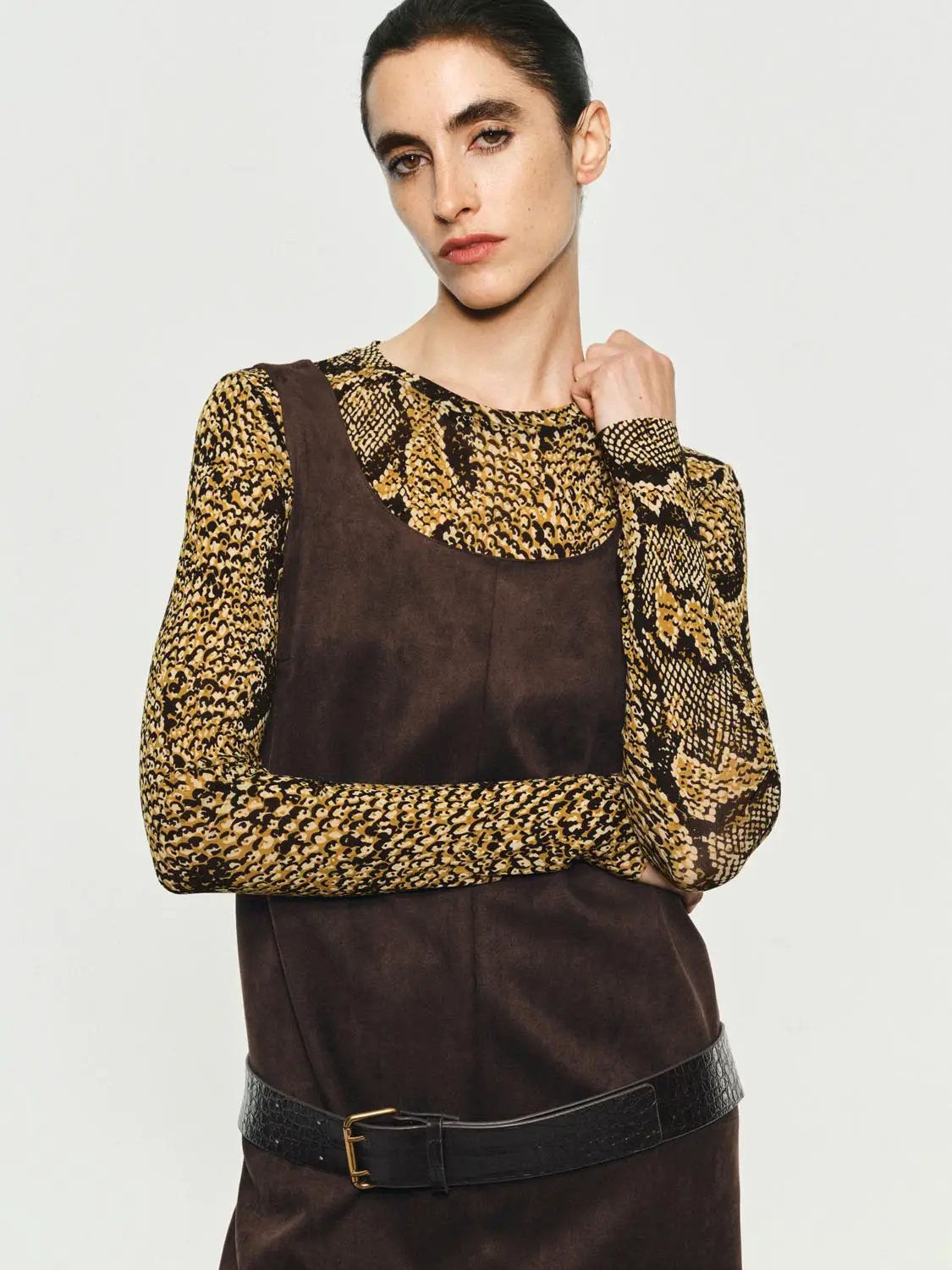 Panelled straight-hem A-line sleeveless mini dress in chocolate brown suede with a black belt