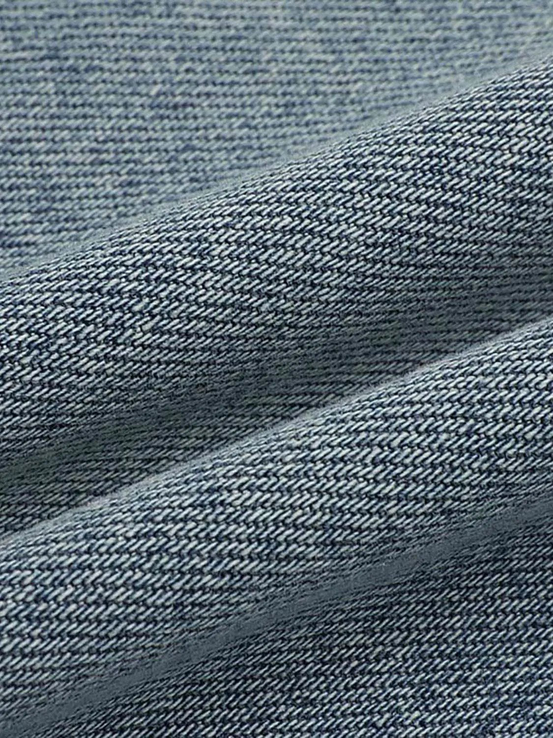 Washed cropped cotton wide-leg jeans blue denim fabric close-up texture