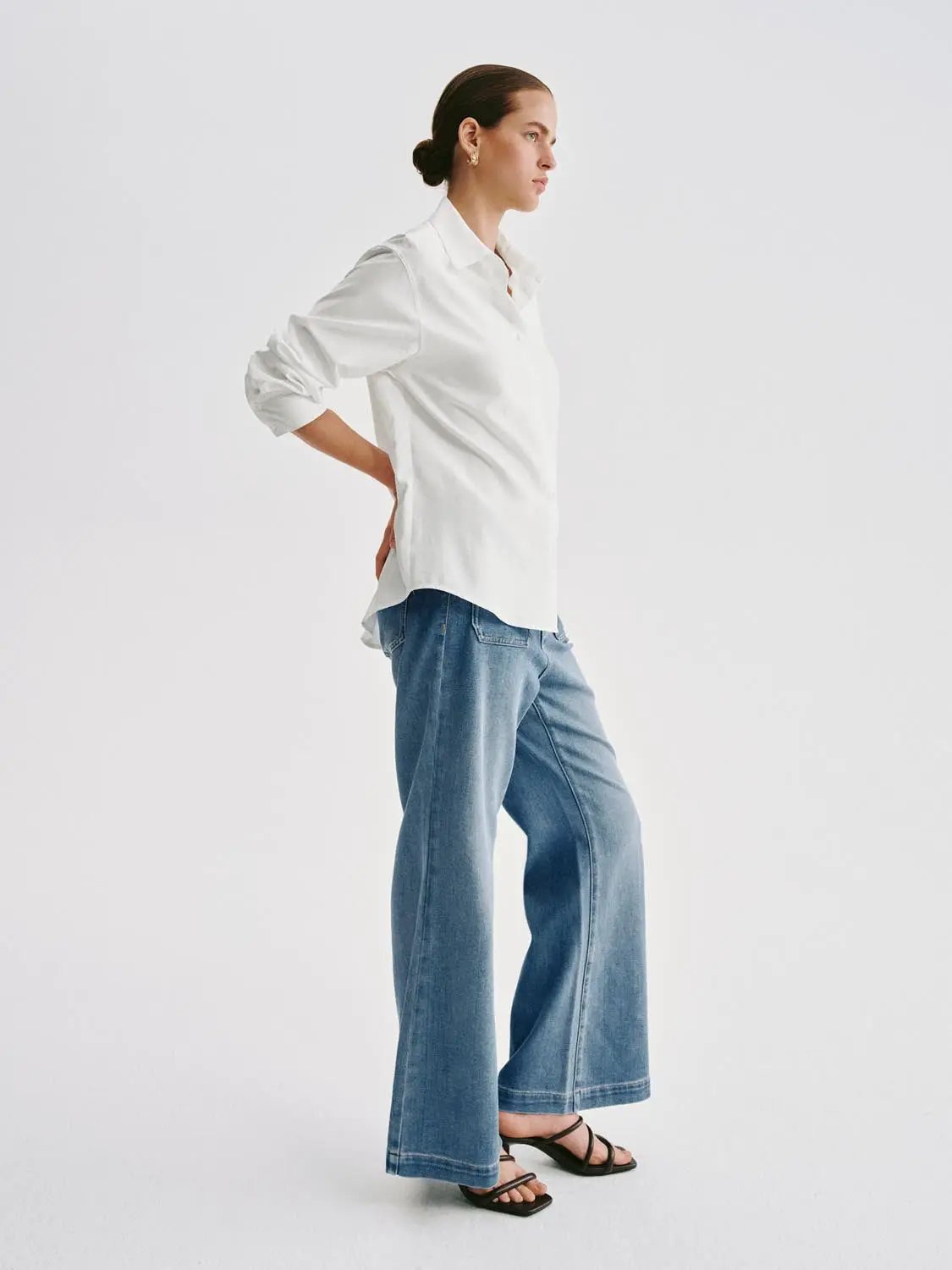 Vintage style patch-pocket wide-leg women's jeans by Urban Revivo Fashion in light blue denim.