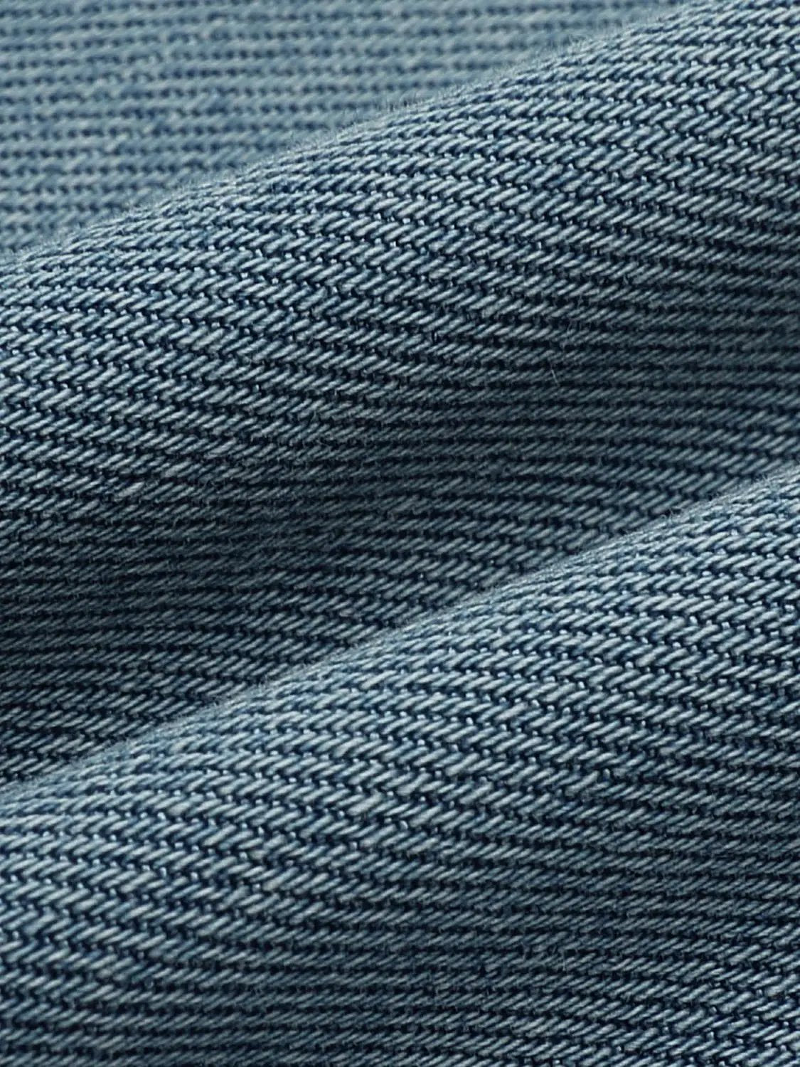 Blue denim jeans fabric close-up by Urban Revivo Fashion