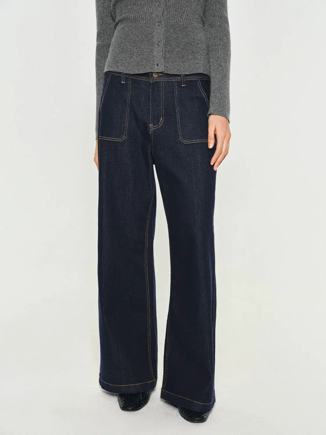 Jeans by Urban Revivo Fashion in dark indigo denim, wide-leg fit, contrast stitching