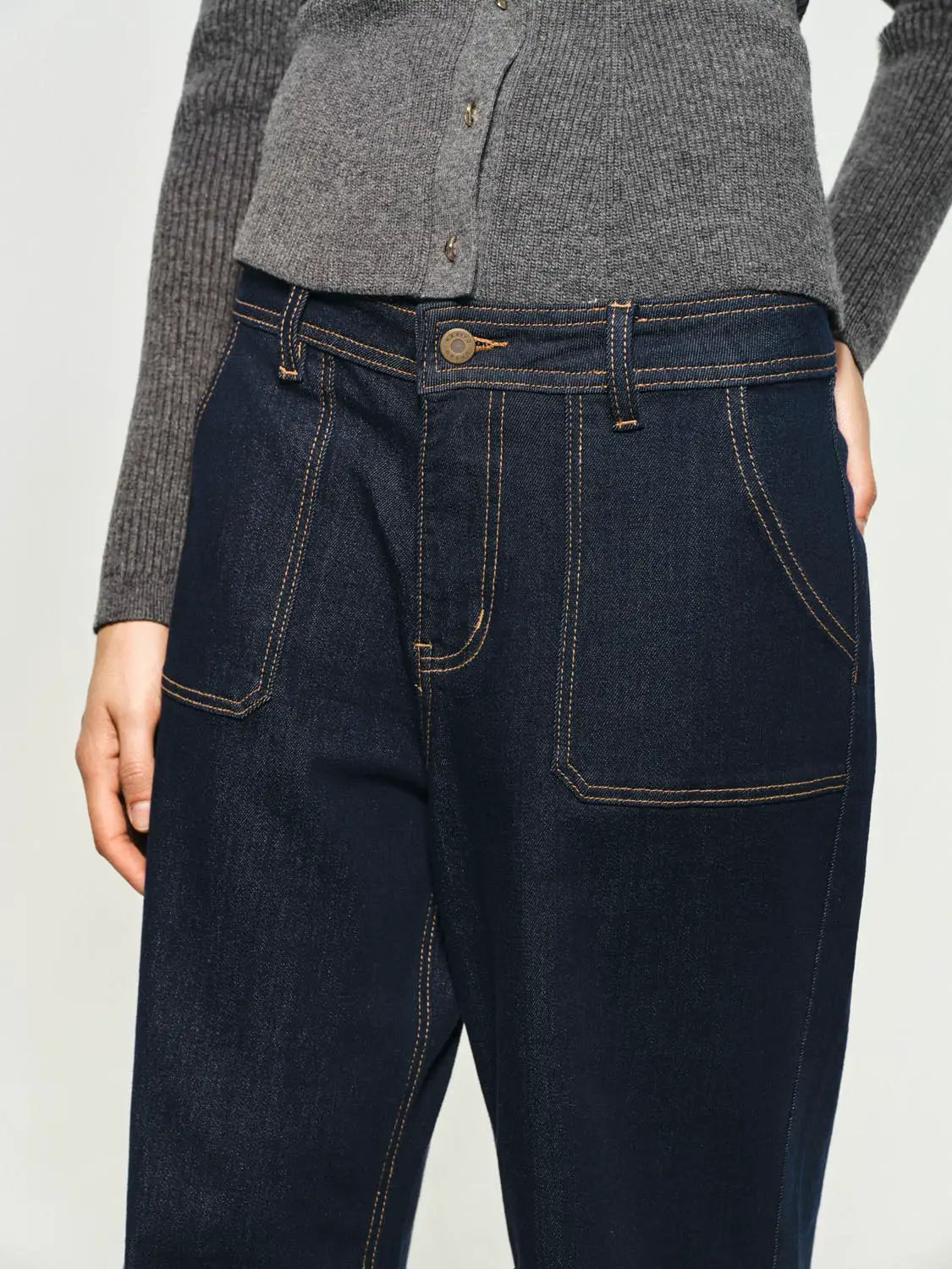 Jeans by Urban Revivo Fashion in dark indigo denim with golden stitching