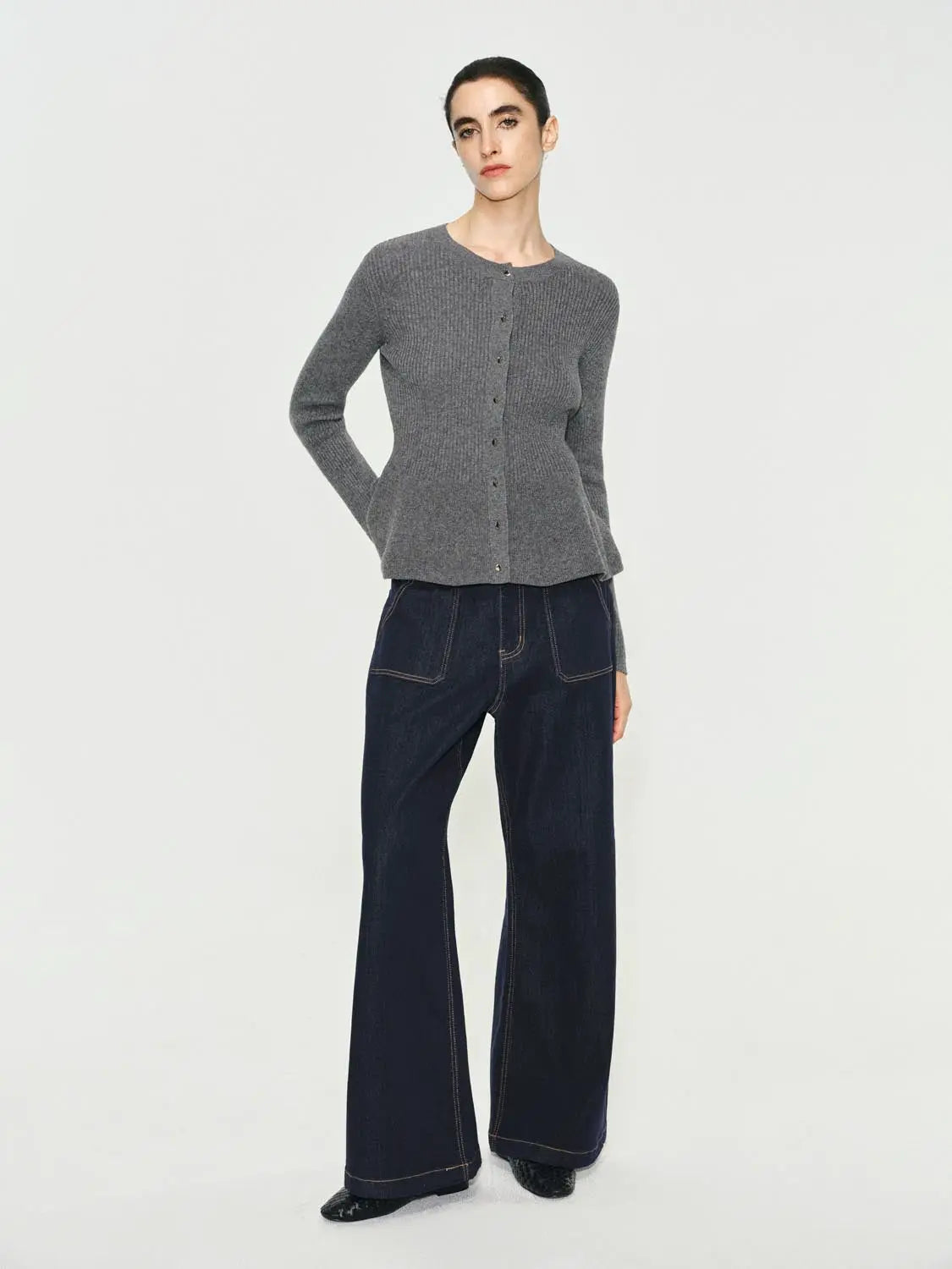 Jeans, dark indigo wide-leg denim with contrast stitching.