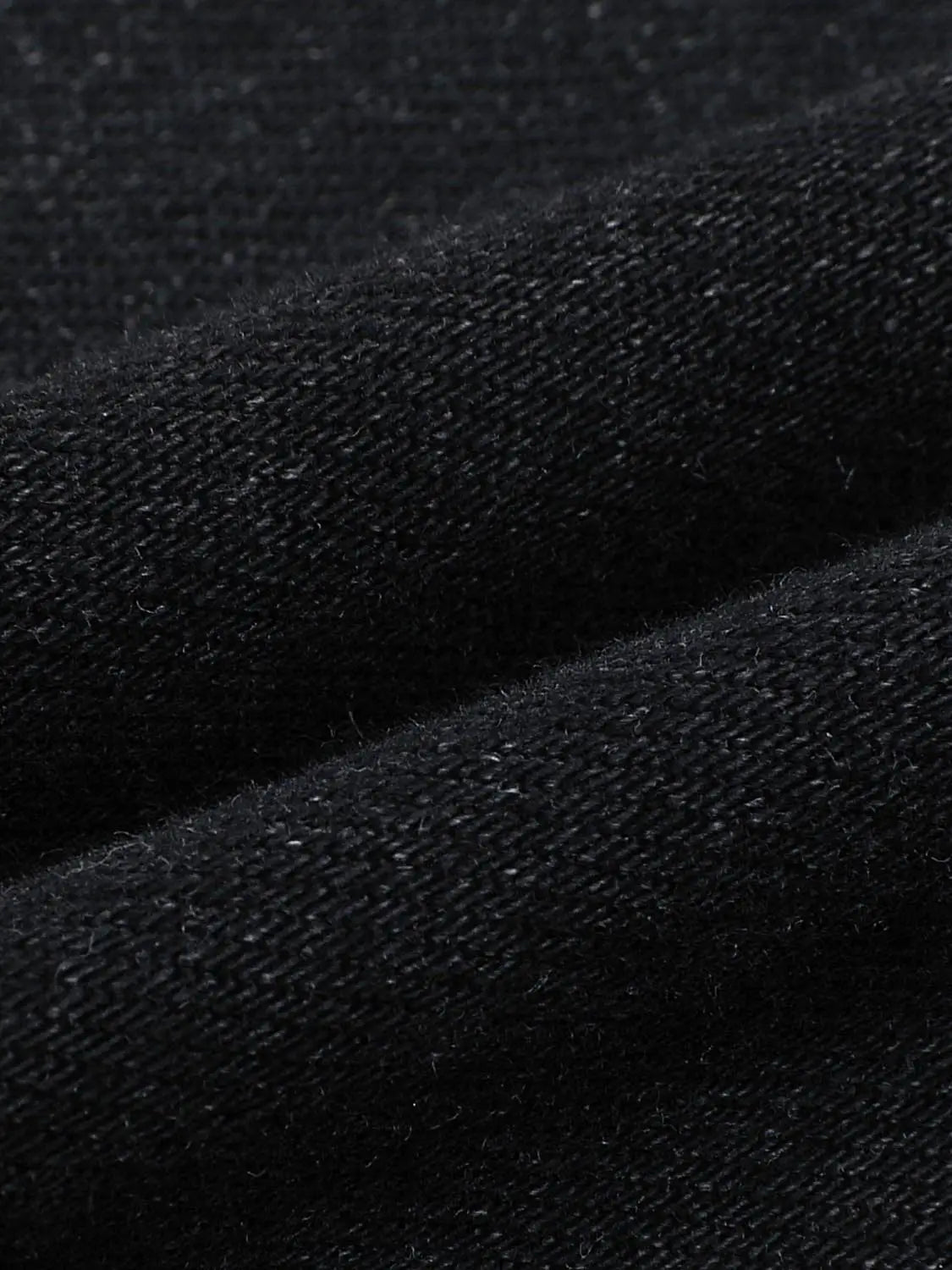 Jeans fabric close-up in black denim by Urban Revivo Fashion