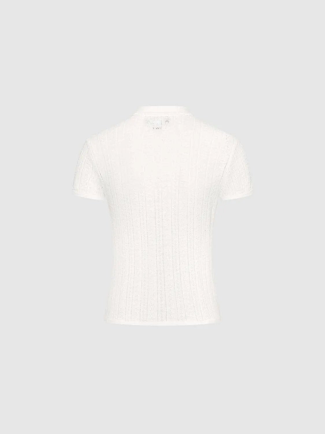 Cable knit ribbed short-sleeve polo cotton shirt, white, back view.