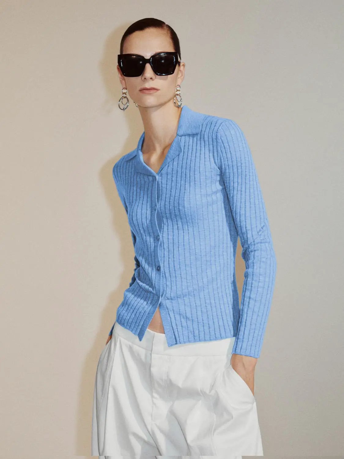 Ribbed cotton-blend shirt-collar cardigan in light blue with button-front.