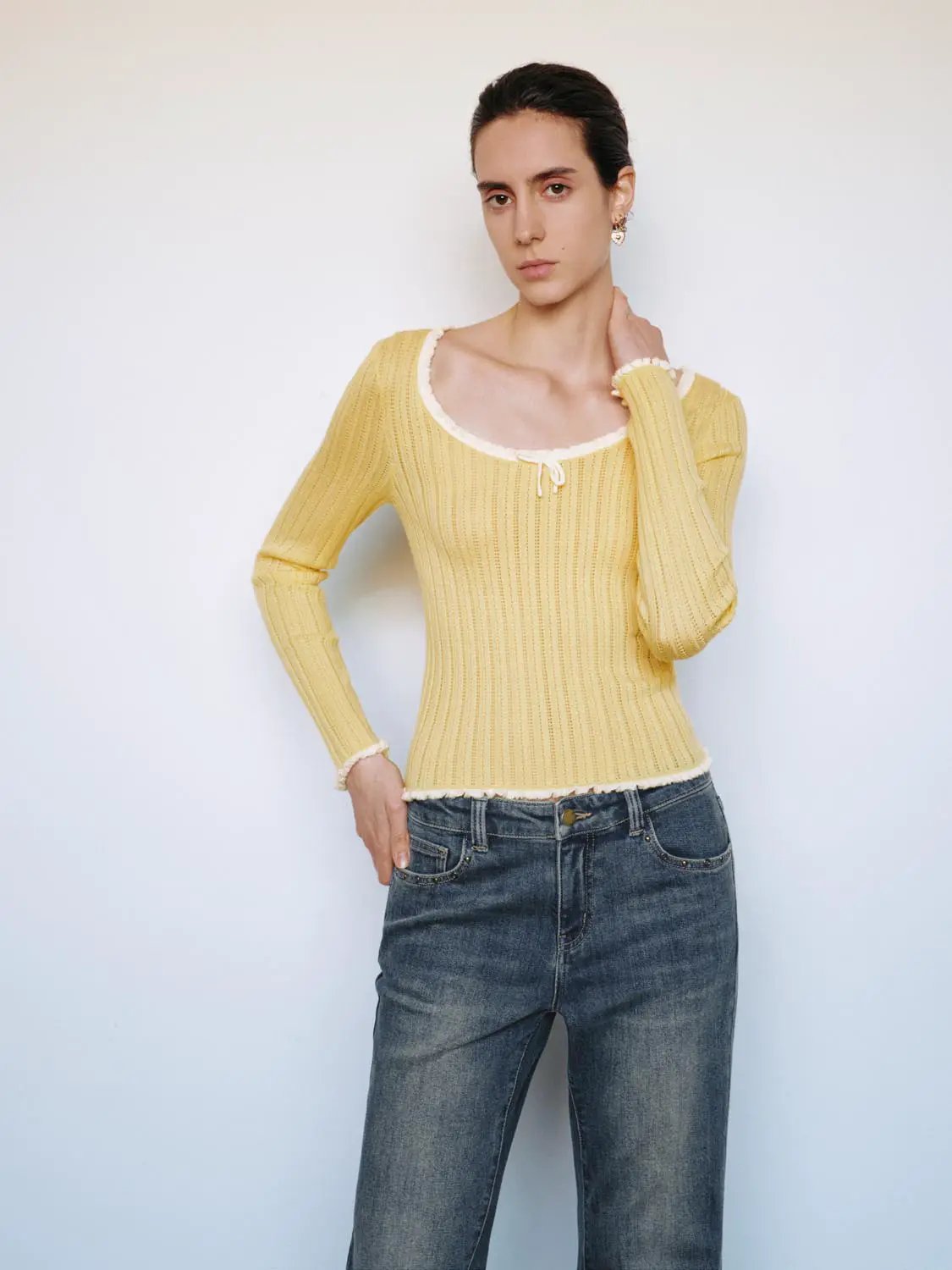 Ribbed square-neck bow long-sleeve knit T-shirt in yellow with white trim and raw hem