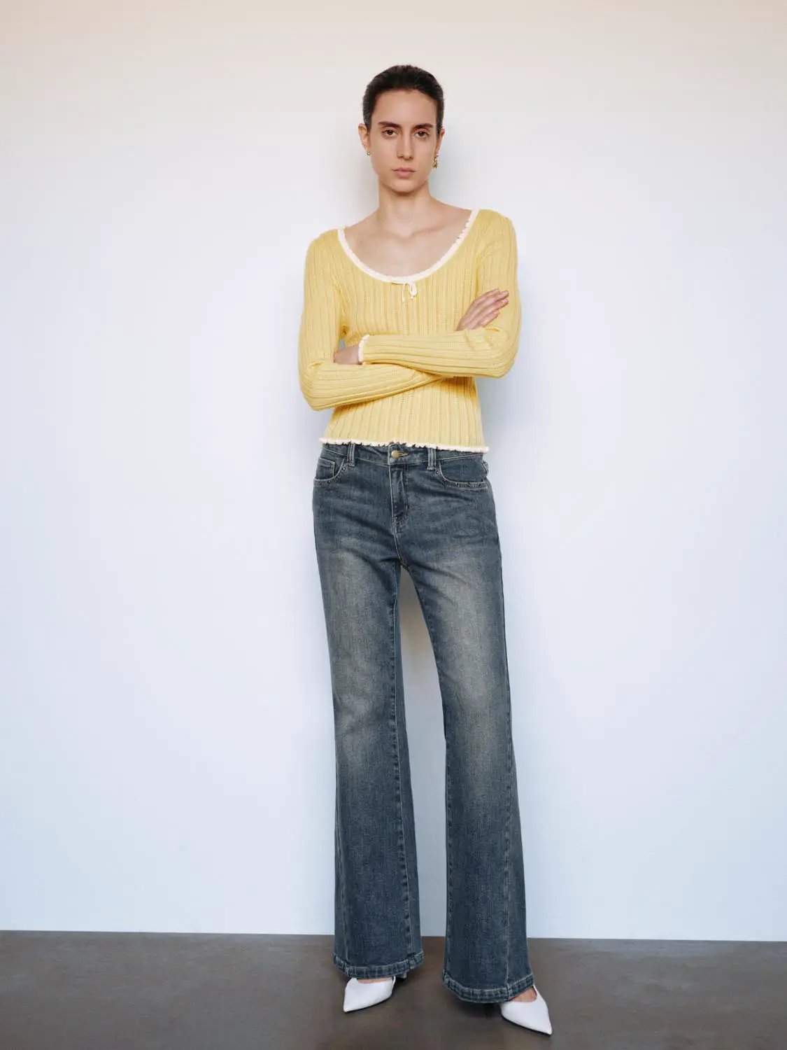 Ribbed square-neck bow long-sleeve knit T-shirt in yellow with a raw hem