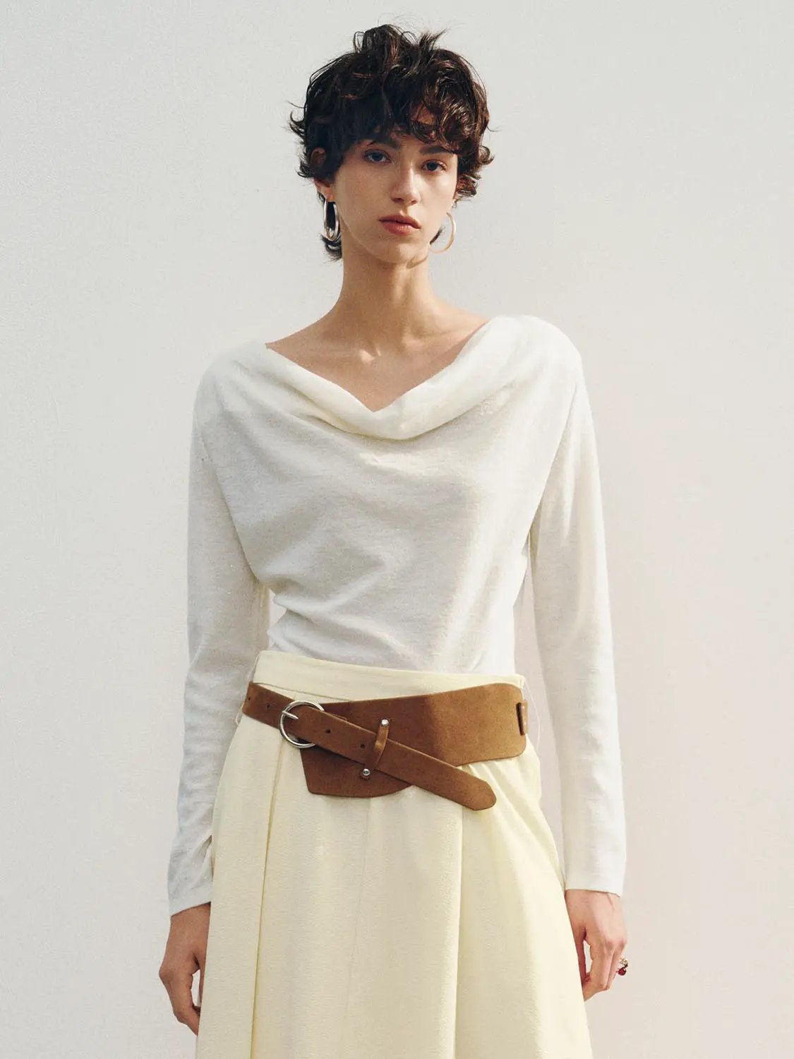 Knit T-Shirt in off-white with a draped neckline and long sleeves.