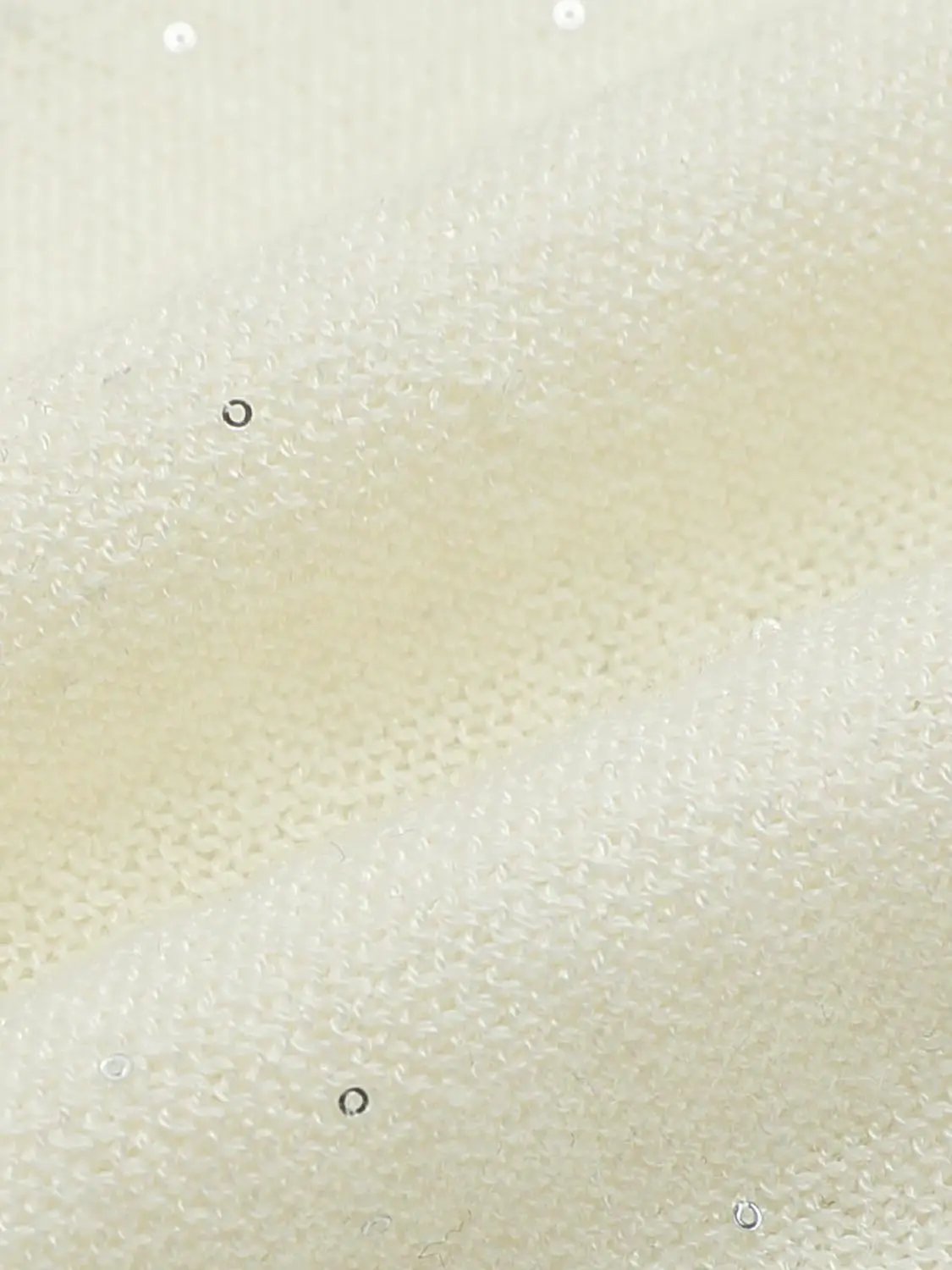 Knit T-Shirt fabric close-up in creamy ivory knit texture