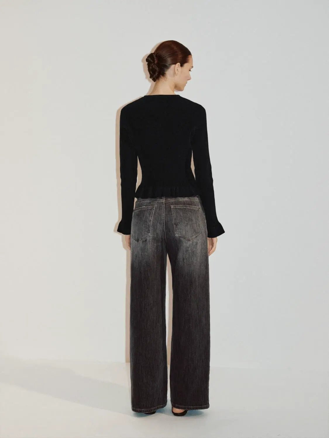 Ribbed heart-button crew-neck long-sleeve cardigan in black.