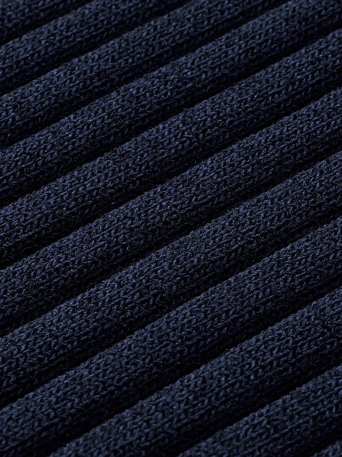 Knitted T-shirts fabric in navy ribbed knit close-up
