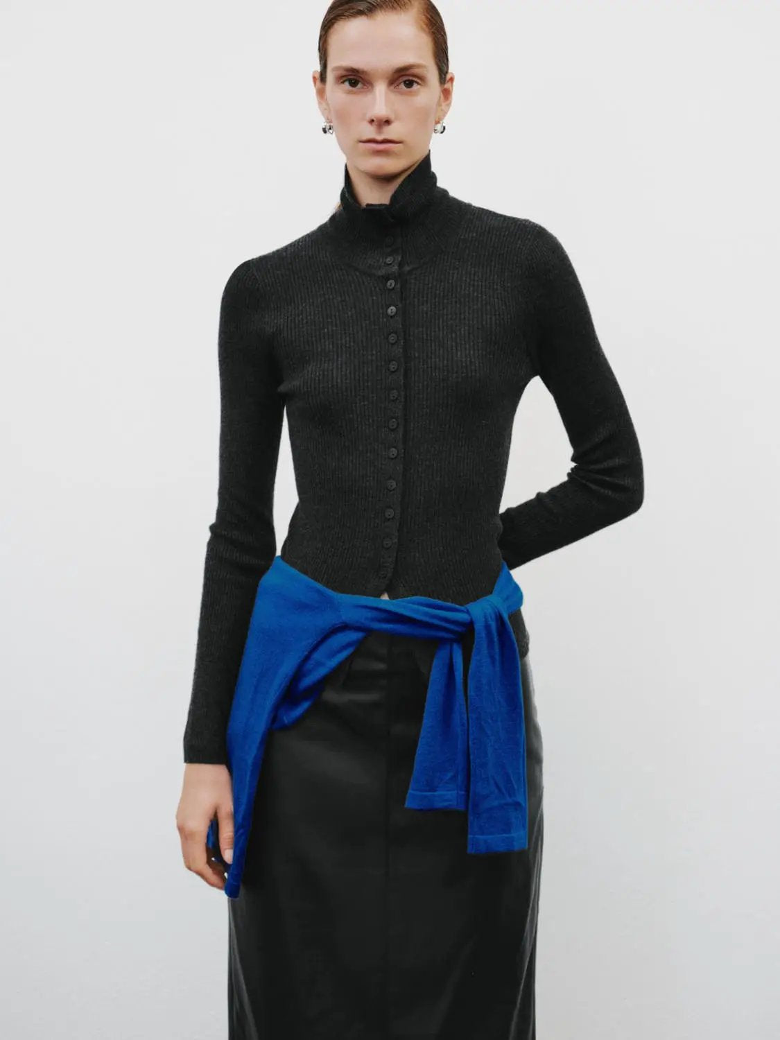 Ribbed slim mock-neck knit cardigan, black, button-front long sleeves.