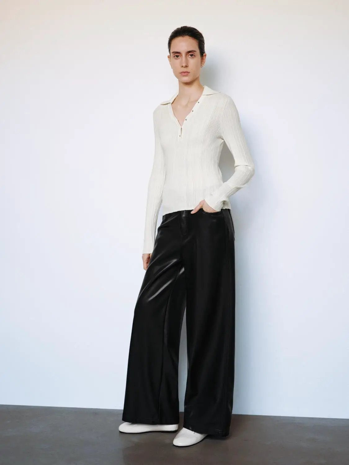 Ribbed Fitted Polo Collar Long Sleeve Sweater in cream, paired with black faux-leather wide-leg pants, two-piece outfit.