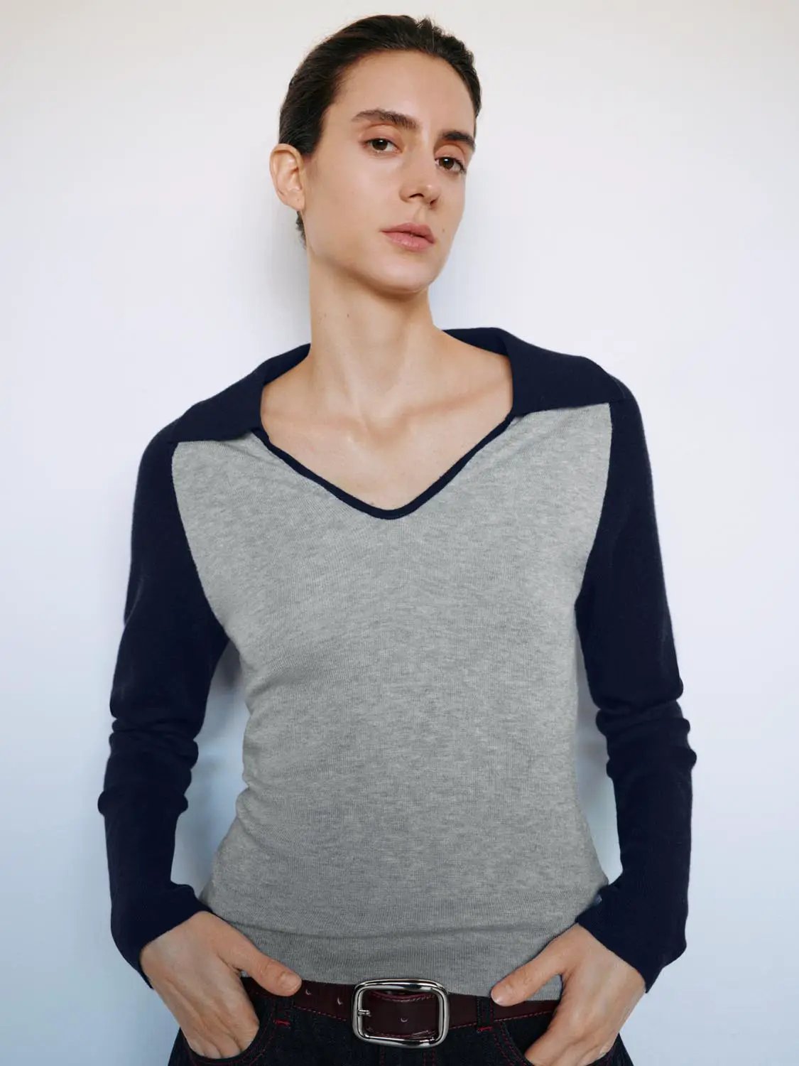 Fitted two-tone V-neck collared long-sleeve knit top, grey body with navy sleeves