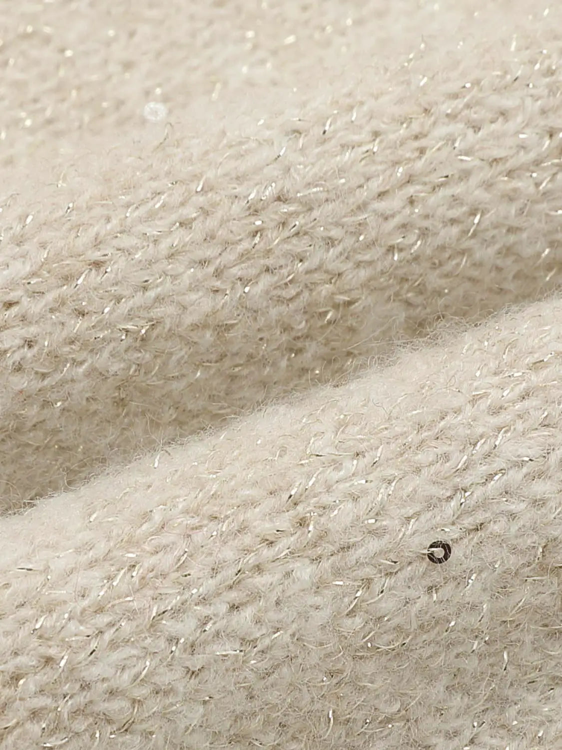 Knit T-Shirt fabric swatch in creamy beige knit with fuzzy texture and subtle metallic sheen