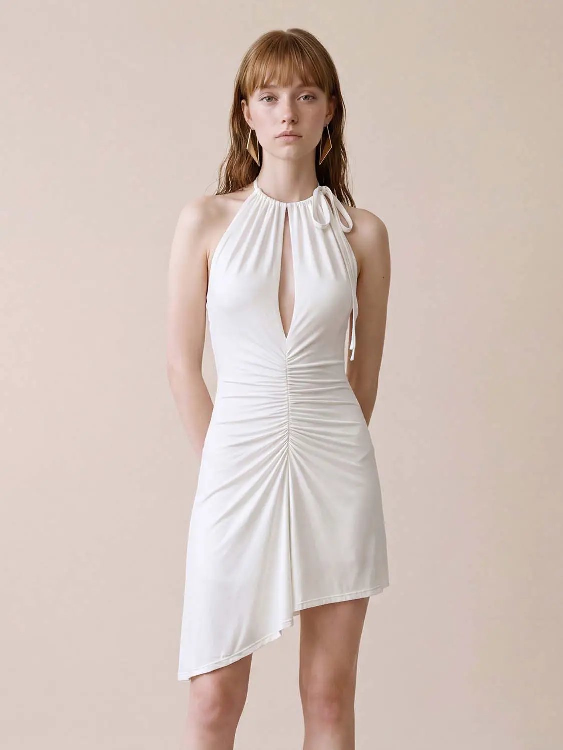 A-line dress by Urban Revivo Fashion in white with a sleek sleeveless silhouette.