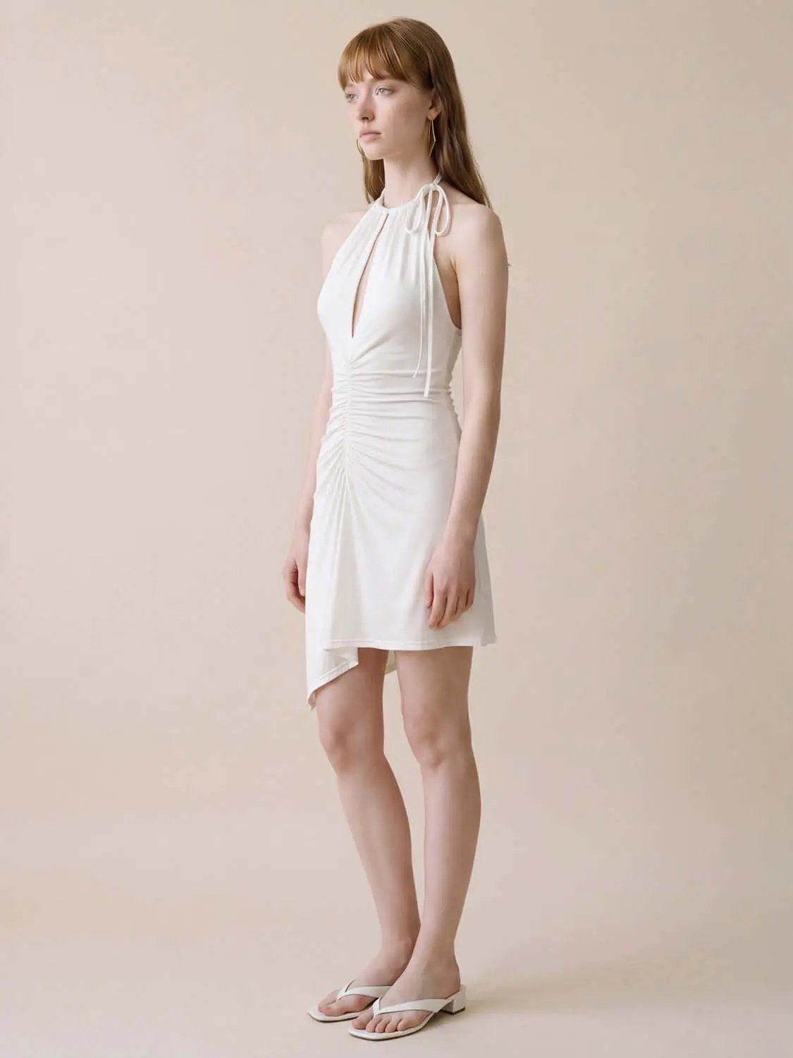 A-Line dresses in white with halter-neck and ruched front detail