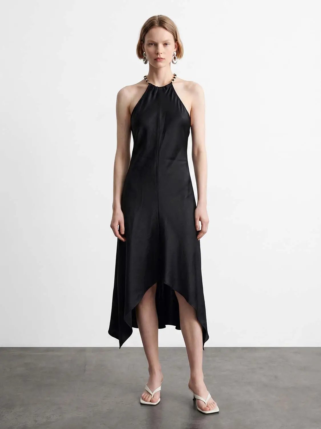 A-Line dress, black satin, halter-neck, asymmetrical high-low hem, Urban Revivo.