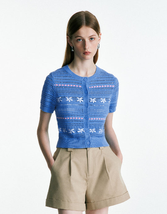 Cárdigan de punto con cuello redondo y crochet