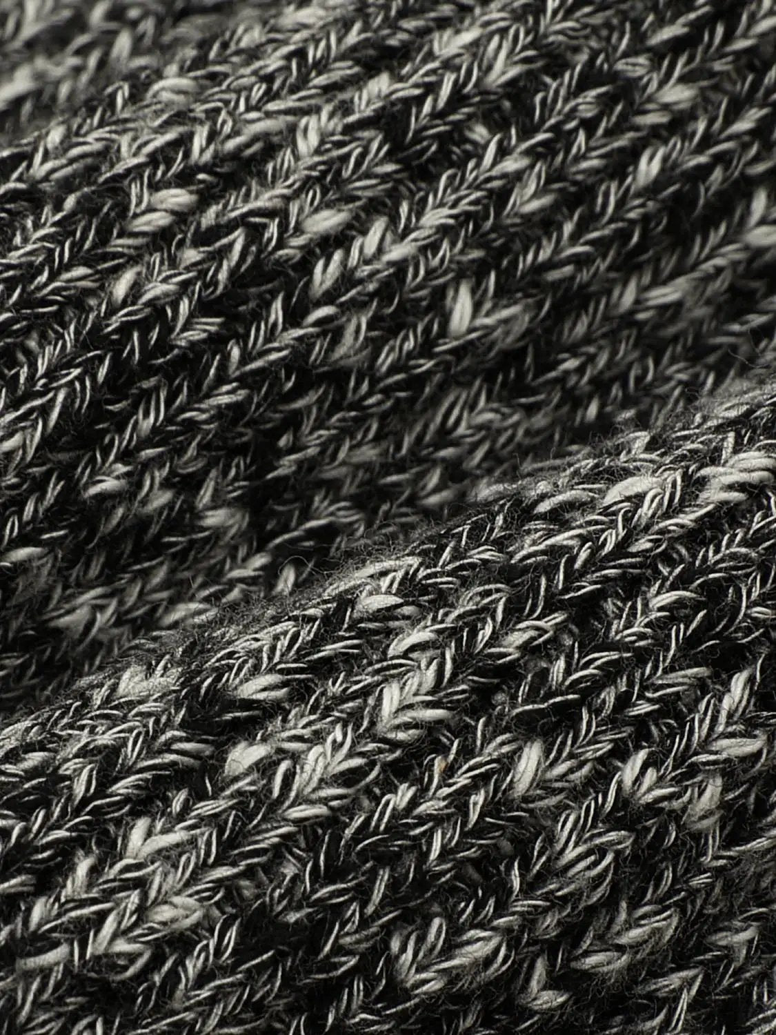 Knitted T-Shirts fabric by Urban Revivo Fashion in black and gray marled knit texture