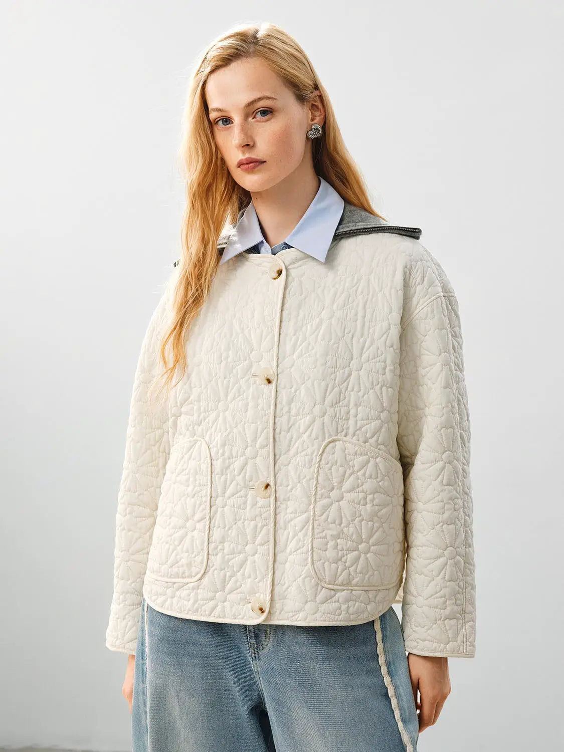 Padded jacket cream quilted with floral pattern, front patch pockets, beige buttons