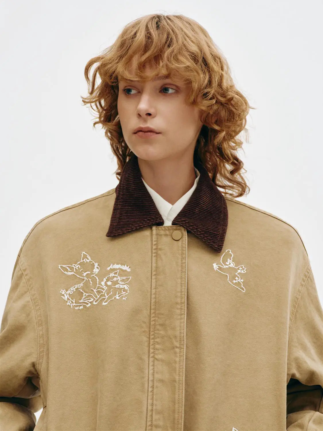 Padded Jacket Urban Revivo tan cotton with dark brown corduroy collar and white embroidered motifs.