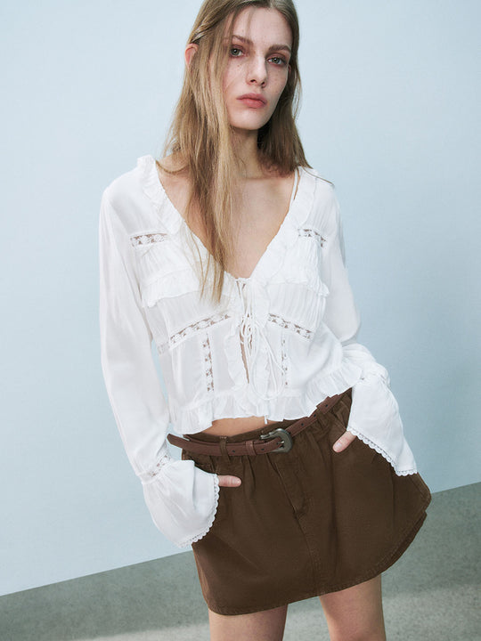 Camisas de manga larga con dobladillo con volantes