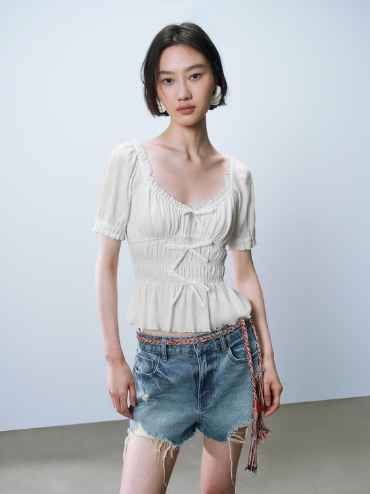 Blouses à décor plissé Bow