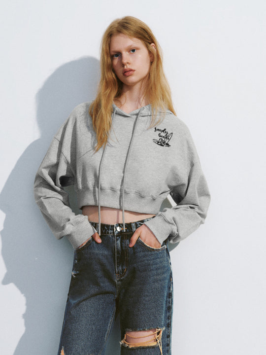 Sweat-shirt ample à capuche court