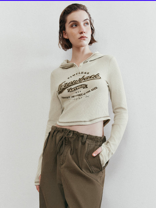 T-shirt skinny con mezza zip