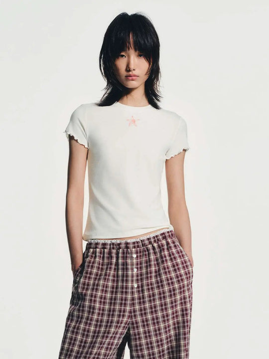 T-shirt con balze stampate
