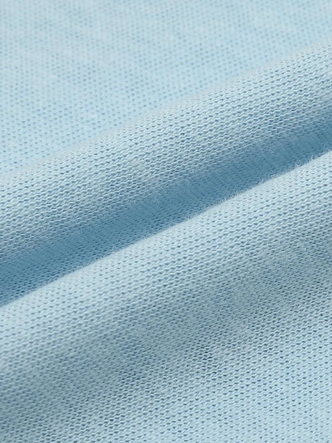 T-shirt knit fabric close-up in light blue by Urban Revivo Fashion