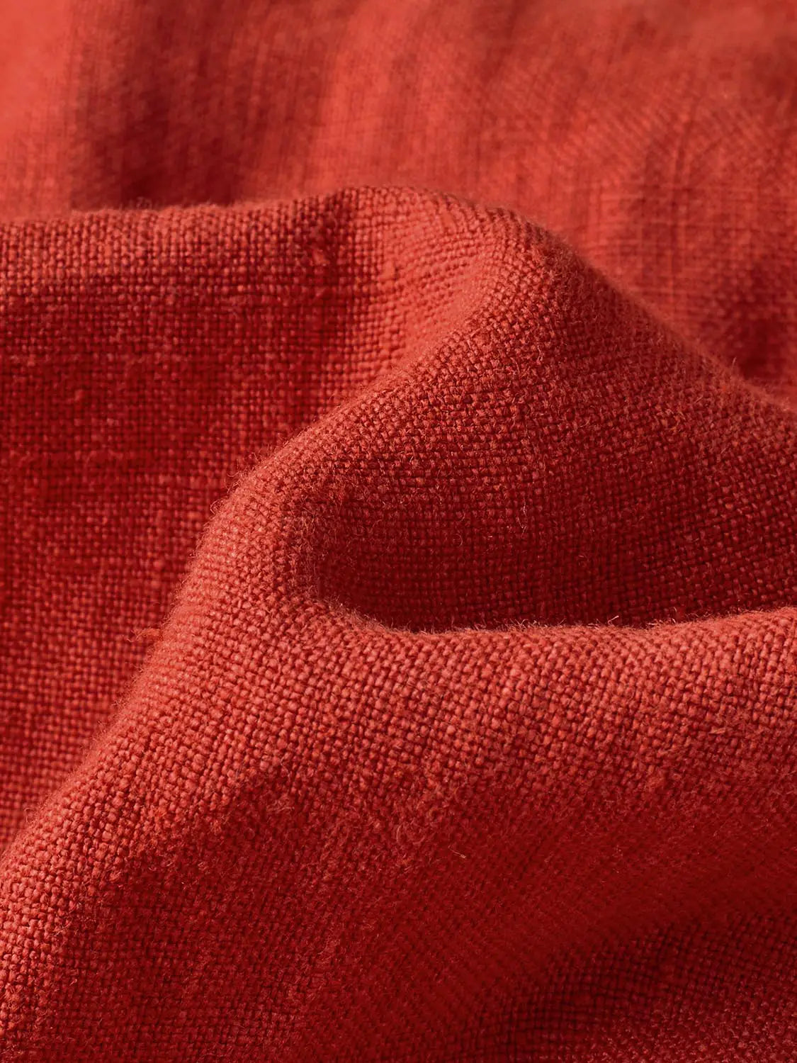 Wide-Leg Pants in red textured woven fabric with close-up detail