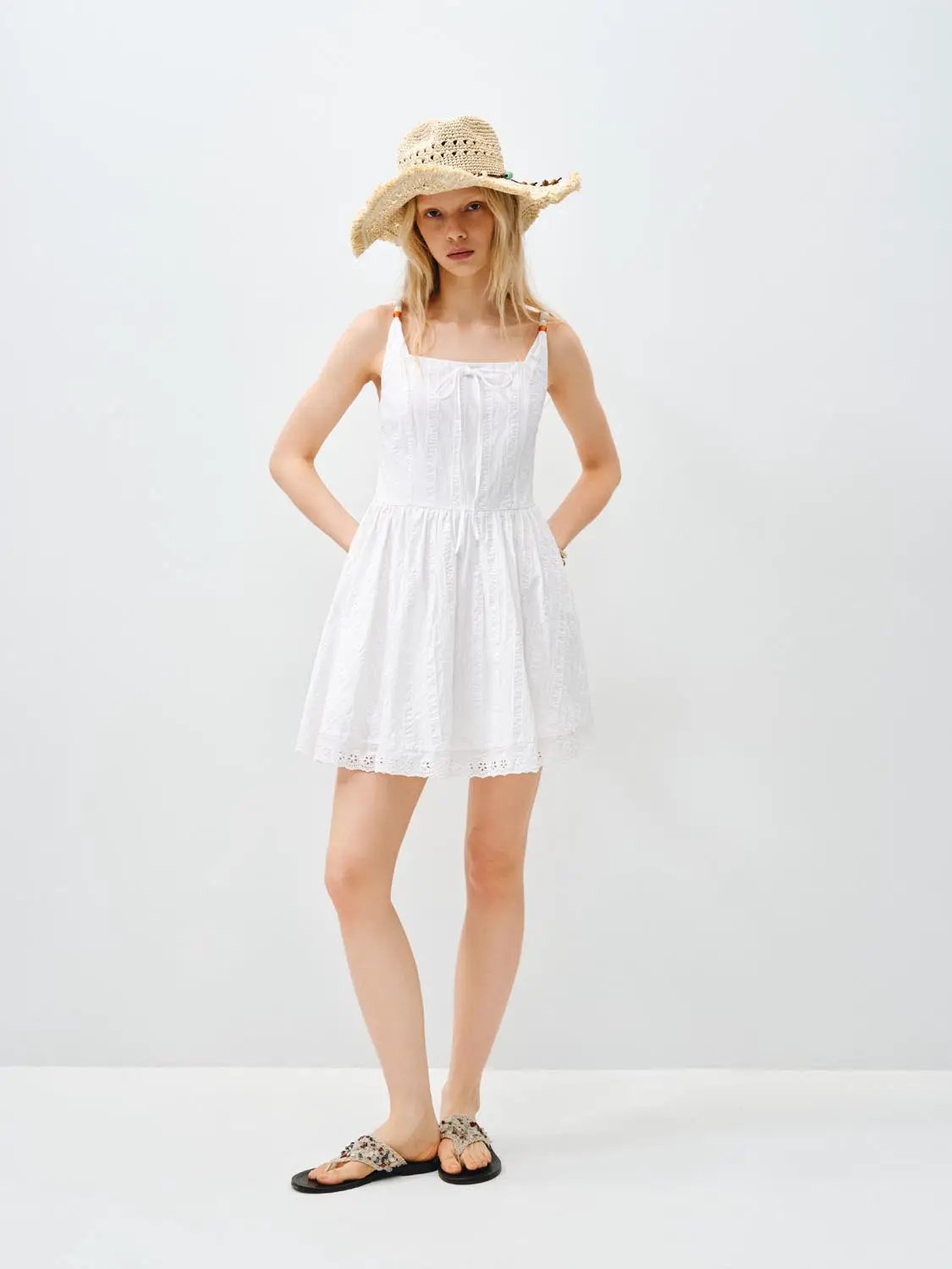 Cotton lace dress, white sleeveless sundress with thin straps.