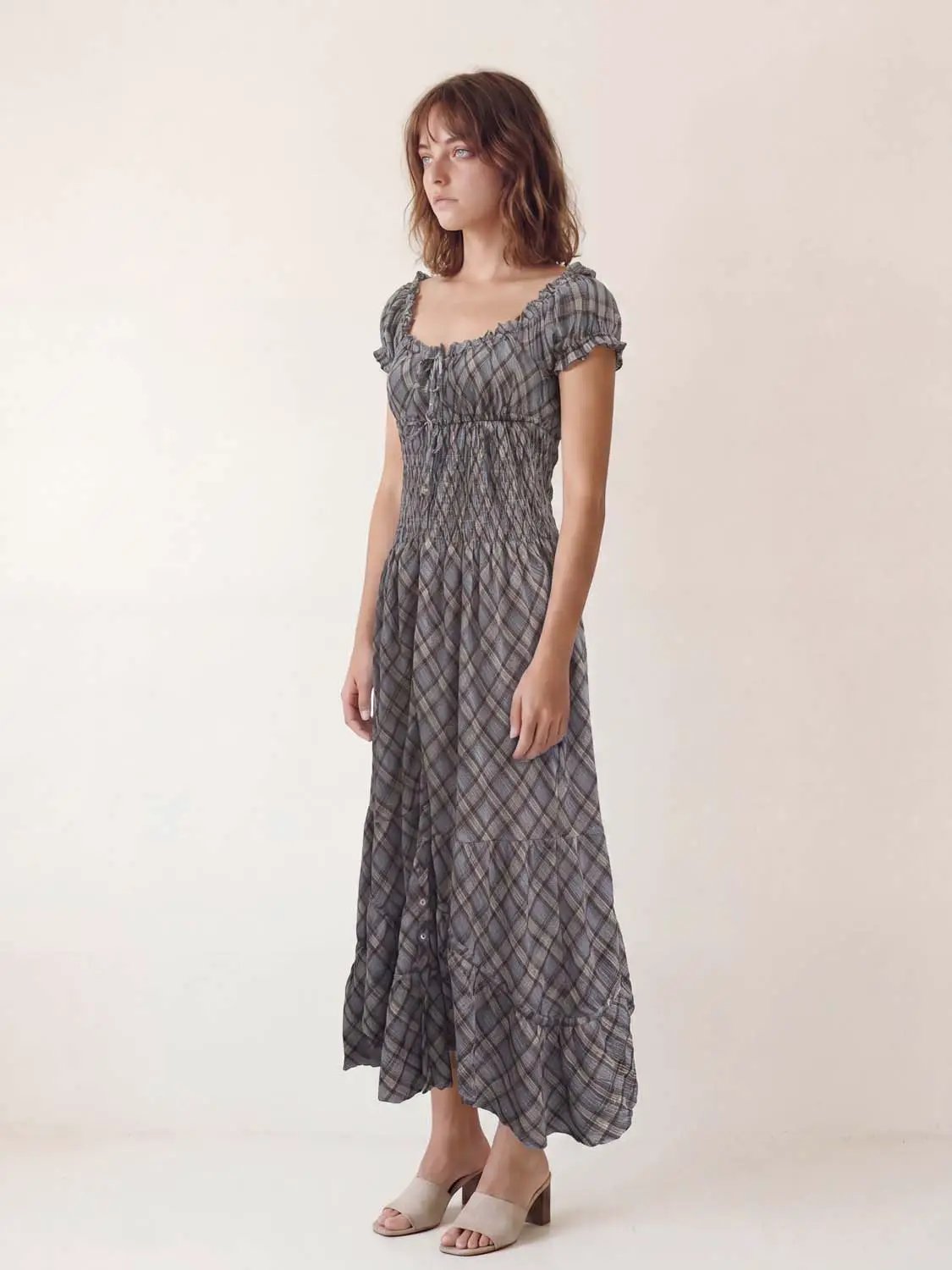 A-line dress in gray plaid with smocked bodice, short puff sleeves, ankle-length