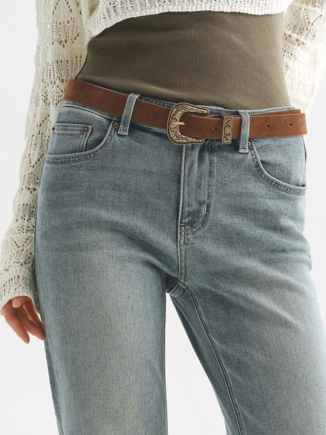 Jeans by Urban Revivo Fashion in light blue denim with brown belt and ornate buckle