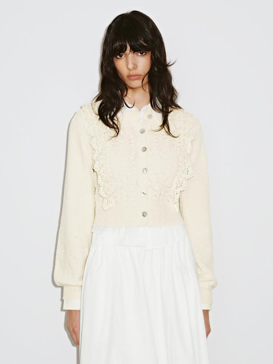 Cappotti lavorati a maglia con volant