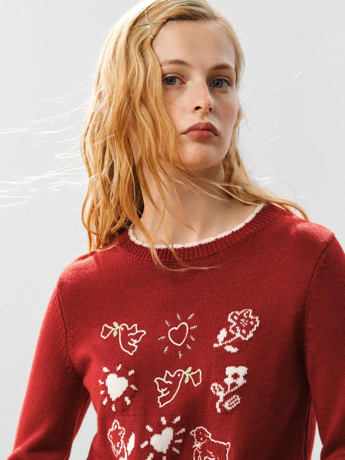 Knitwear T-shirt in red knit with white graphic prints on front; crew neck.