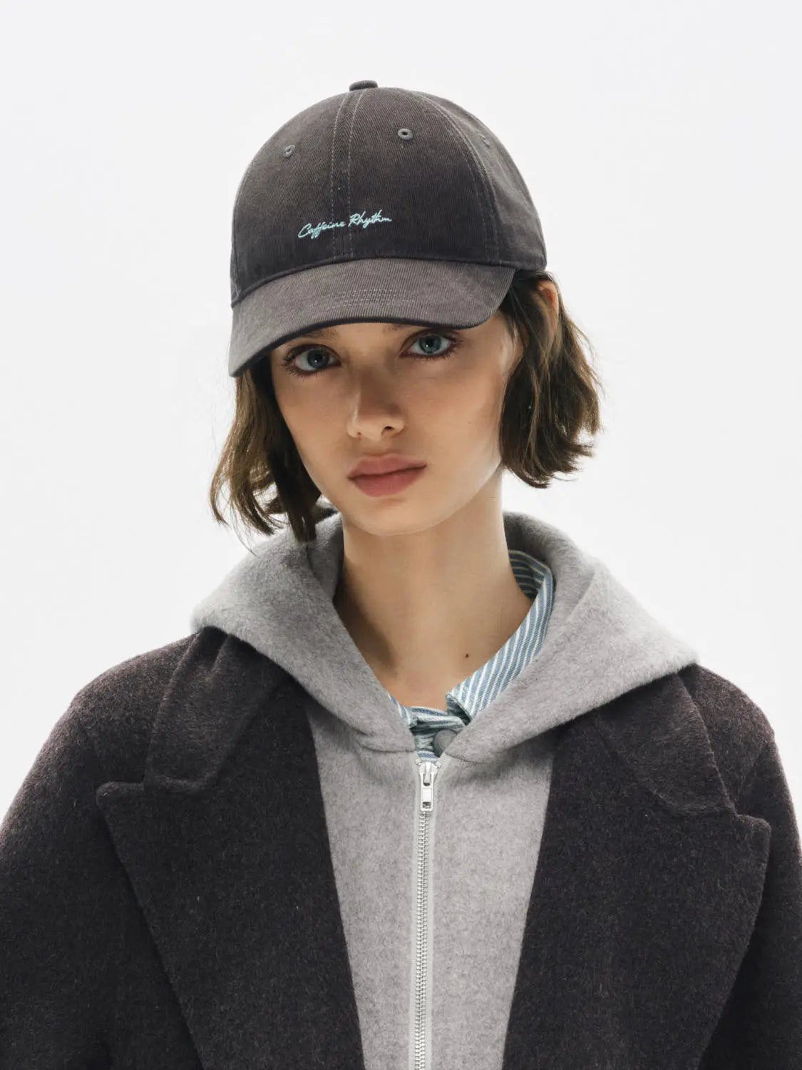 Coat by Urban Revivo Fashion; dark charcoal wool over grey zip-front hoodie with blue striped shirt underneath.