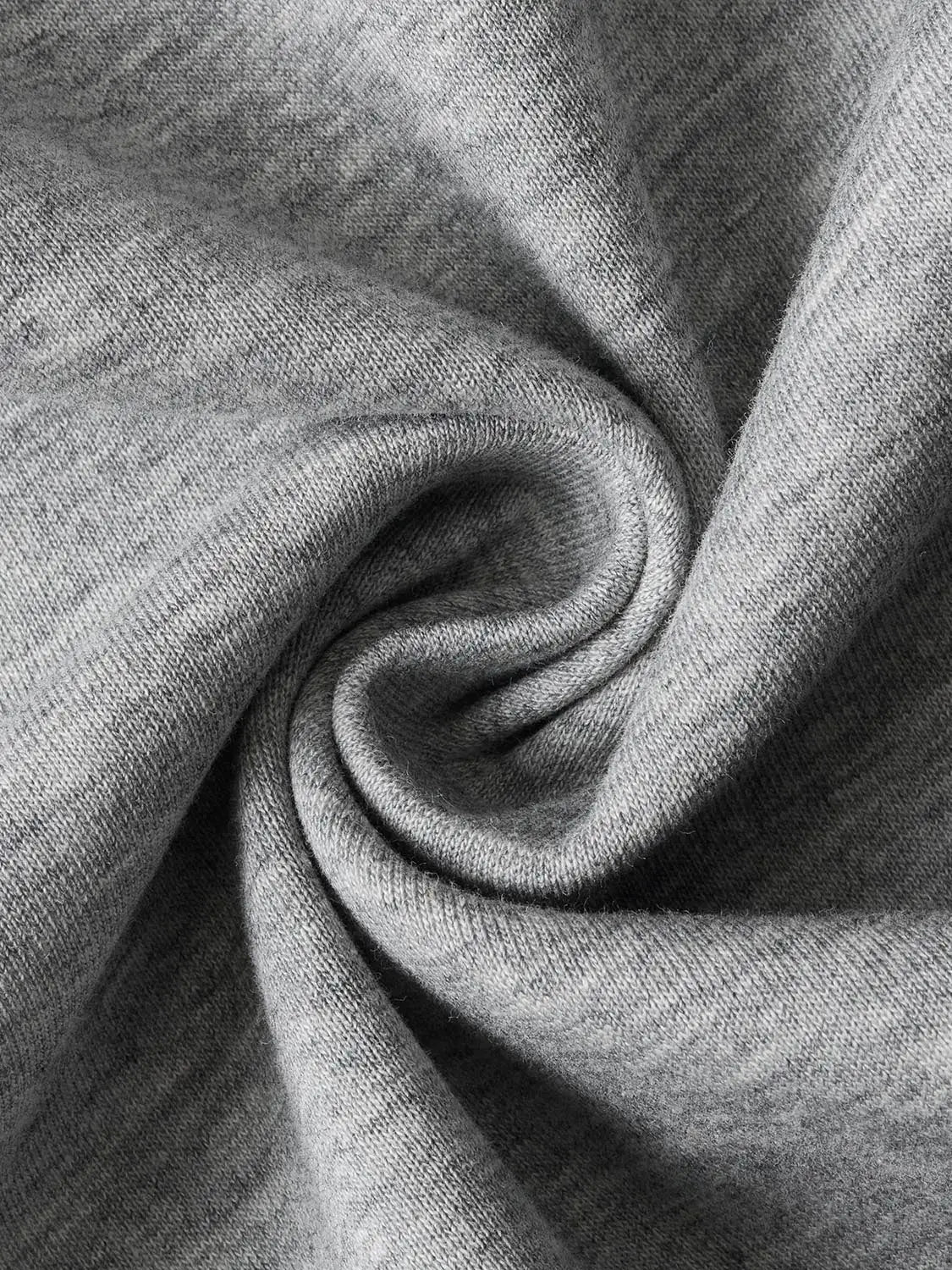 Sweatshirt jacket fabric close-up in heather grey knit material for casual streetwear style