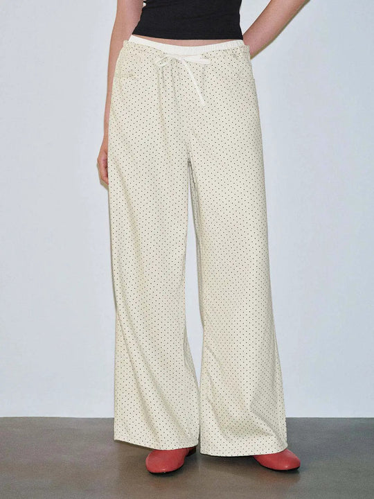 Jeans larges à pois avec cordon de serrage