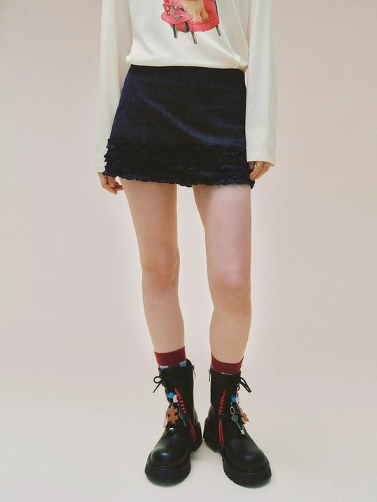 Gonna corta in denim di cotone a trapezio con orlo arricciato